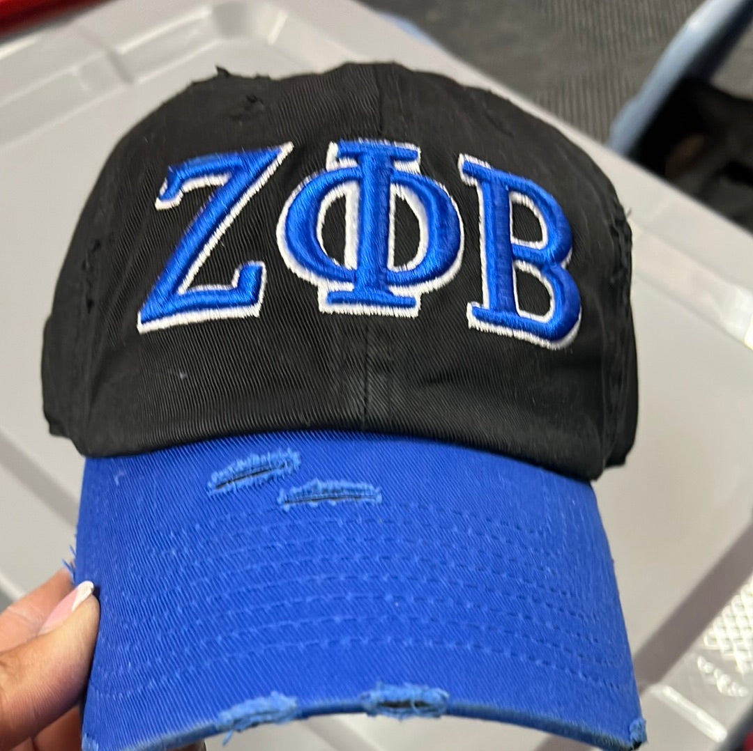 Distressed Zeta baseball caps with 3D lettering